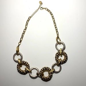 Gold and silver colored necklace